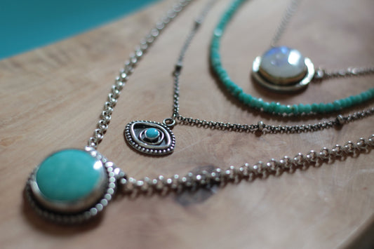 Handmade jewellery items with moonstone, turquoise and sterling silver
